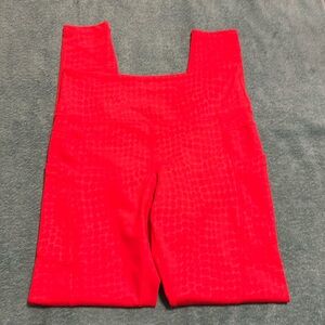 Washed, never worn Zyia active. Size 6-8. Red leggings with pockets!